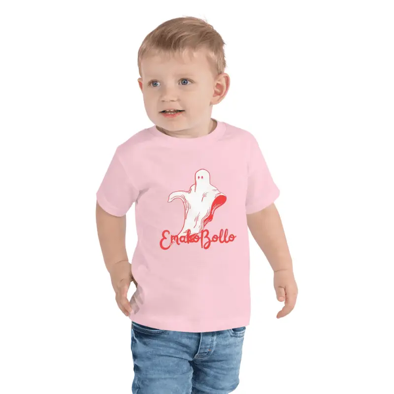 enfant en bas âge souriant arborant un t-shirt enfant manches courtes avec l'imprimé EmakoBollo